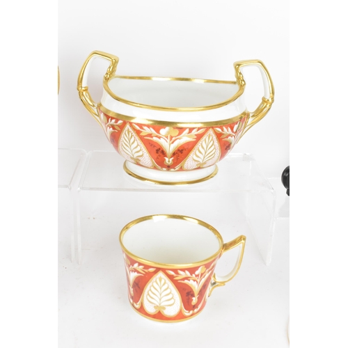 95 - A selection of early 19th century Derby porcelain to include a circa 1820 tea cup and saucer with a ... 