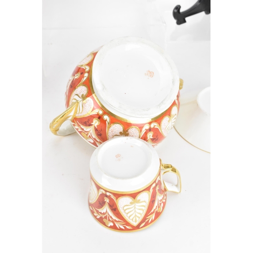 95 - A selection of early 19th century Derby porcelain to include a circa 1820 tea cup and saucer with a ... 