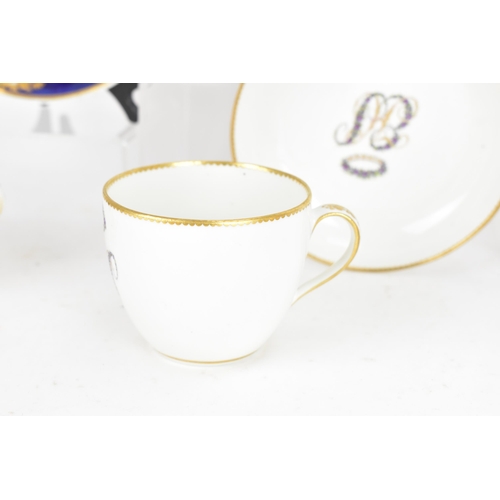 95 - A selection of early 19th century Derby porcelain to include a circa 1820 tea cup and saucer with a ... 