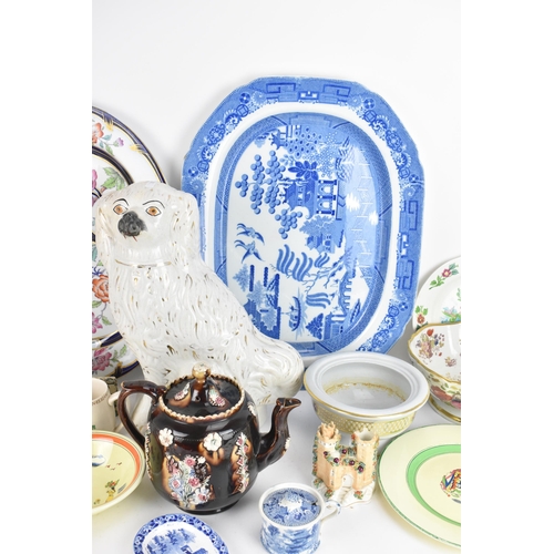 99 - A mimed lot of 19th century and later porcelain to include a Minton hand-painted plate with date mar... 