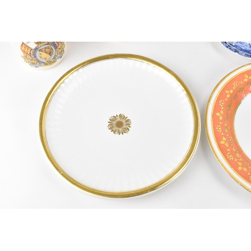 99 - A mimed lot of 19th century and later porcelain to include a Minton hand-painted plate with date mar... 