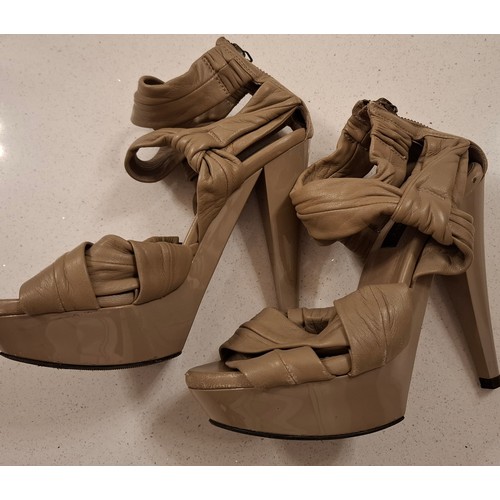 12 - Burberry-A post 1999 pair of taupe peep toe shoes with leather uppers and zip fastening to the ankle... 