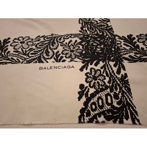 19 - Balenciaga- A white and black fringed silk scarf with floral design. Location:
Condition:Areas of li... 