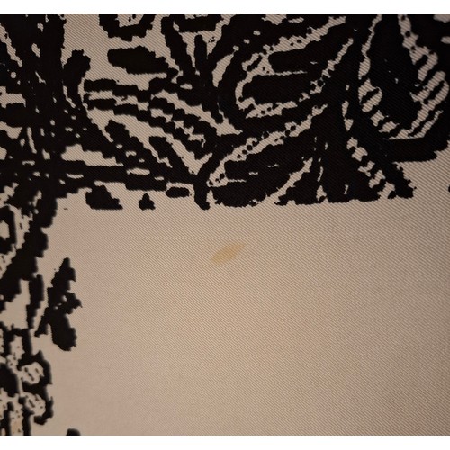 19 - Balenciaga- A white and black fringed silk scarf with floral design. Location:
Condition:Areas of li... 