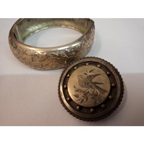 63 - Vintage costume jewellery and collectables to include an engraved white metal hinged bangle, a Turnb... 