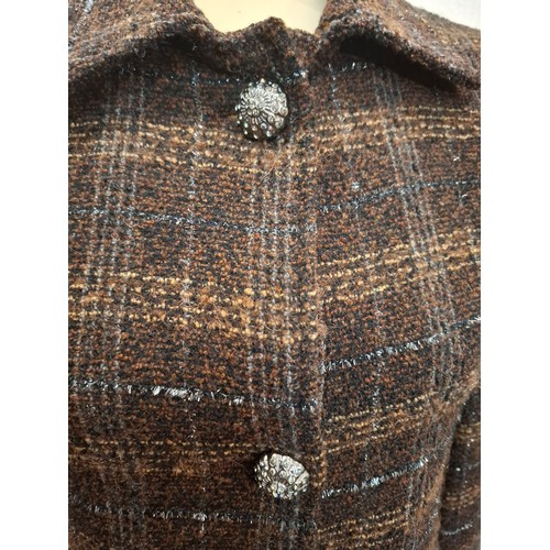 5 - Dolce & Gabbana- A brown checked woollen boucle jacket, European size 40, having a mustard coloured ... 