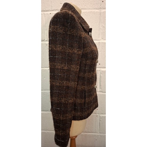 5 - Dolce & Gabbana- A brown checked woollen boucle jacket, European size 40, having a mustard coloured ... 