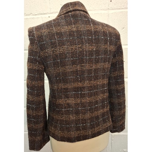 5 - Dolce & Gabbana- A brown checked woollen boucle jacket, European size 40, having a mustard coloured ... 