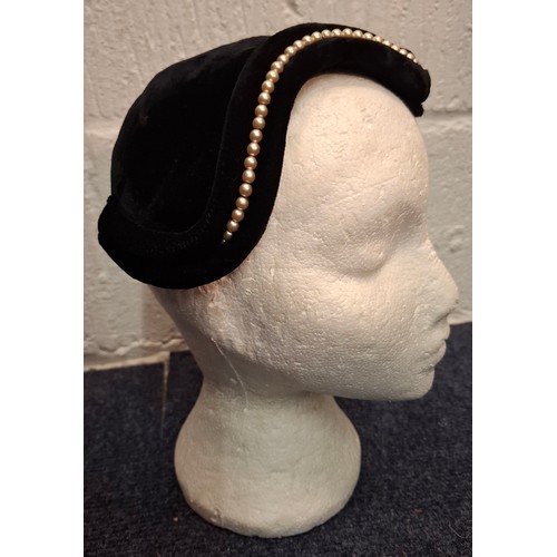 50 - A group of mid 20th Century and later hats to include a Sandra Phillipps navy felt and velvet hat, t... 