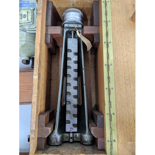 333 - A PVE AP993-013 engineering equipment cased, a MEG Tester, along with two wooden boxes with hinged l... 