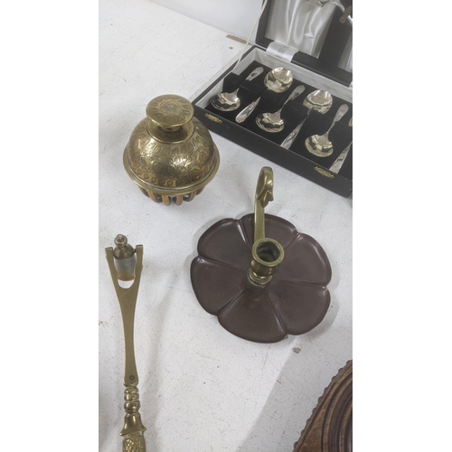 295 - A mixed lot to include an Art nouveau chamber stick candle holder, brassware to include a candle snu... 