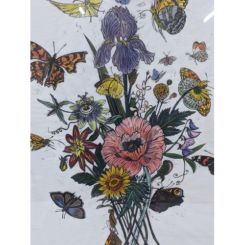 310 - A limited edition print, numbered 3/50 titled 'Country Garden Butterflies', ear signature John Norri... 