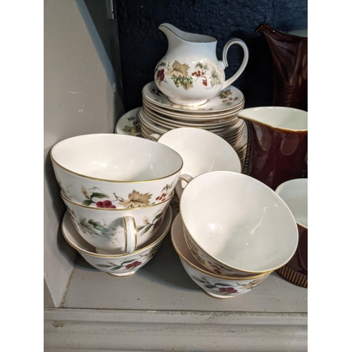 340 - A part Poole pottery coffee set, and a part Royal Doulton dinner service Arden pattern
Location: 3.3... 