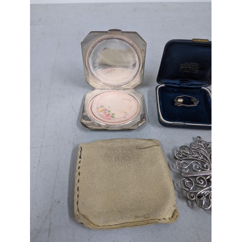 350 - A silver buckle along with silver plated compacts and a brooch
Location: A1B
If there is no conditio... 