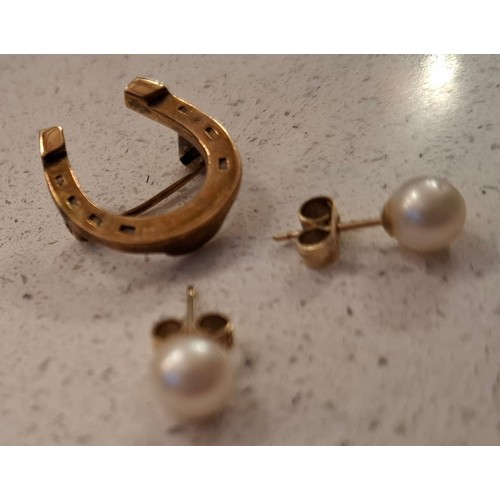 358 - A 9ct gold horseshoe brooch and a pair of 9ct gold and pearl earrings with 9ct gold backs. Location:... 