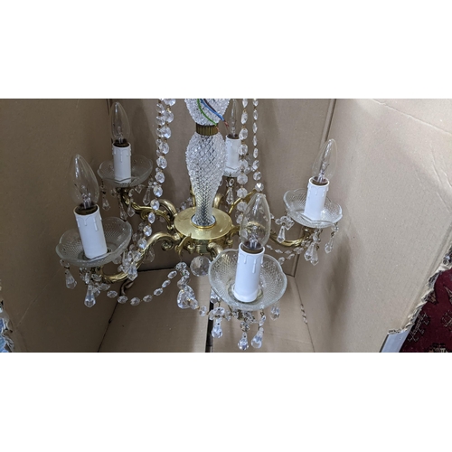 341 - A crystal lustre drop five branch chandelier together with an early 20th century 8 day wall hanging ... 