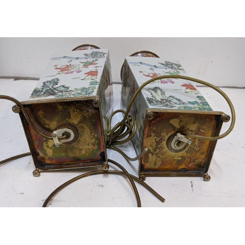 285 - A pair of mid century Chinese converted table lamps decorated with traditional oriental scenes 57cmh... 