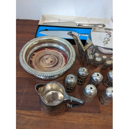 308 - Silver plate and EPNS tableware to include teapots, salts, a wine/bottle coaster and other items Loc... 