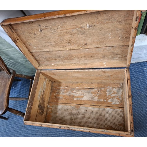 236 - A small stained pine travel trunk having wrought iron side handles. Location:RWM
If there is no cond... 