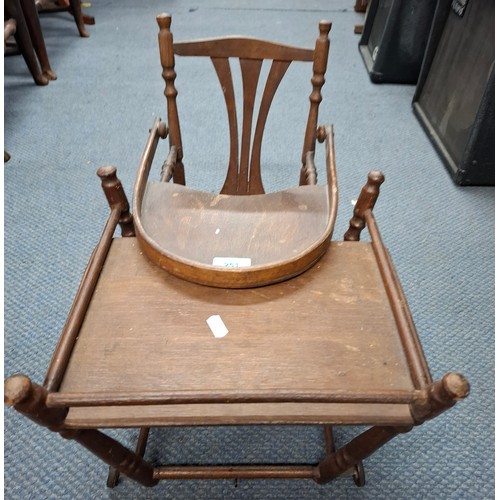 251 - A vintage wooden baby/doll's metamorphic highchair. Location:A1F
If there is no condition report, pl... 