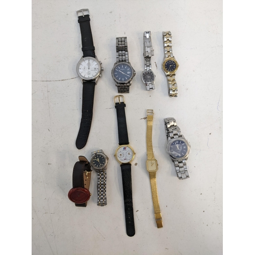 206 - A collection of ladies and gents wrist watches to include Ted Baker, a United Airlines watch, a ladi... 