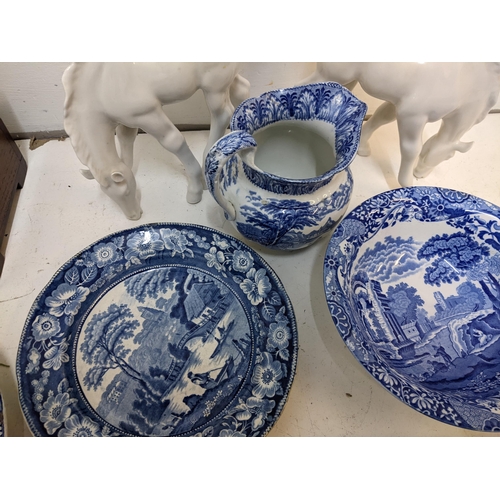 217 - A mixed lot to include two porcelain horses A/F, a late 19th century blue and white meat platter dep... 