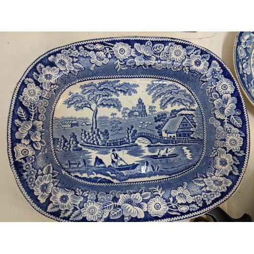 217 - A mixed lot to include two porcelain horses A/F, a late 19th century blue and white meat platter dep... 