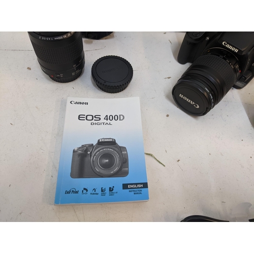 221 - A Canon EOS camera and 58mm and 52mm lenses and accessories
Location: 1-2
If there is no condition r... 