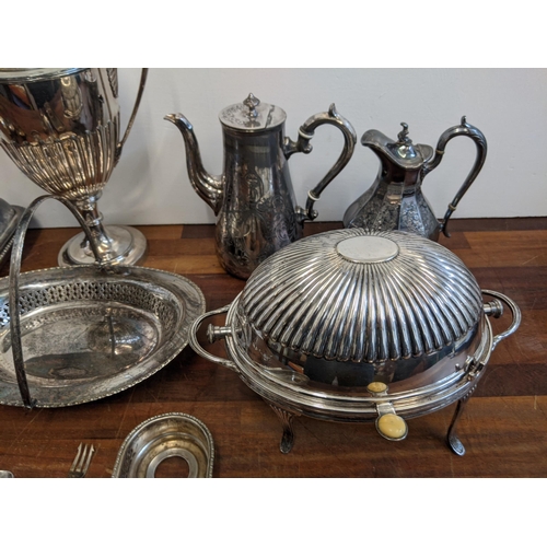 230 - A collection of silver plate and EPNS to include a silver jug, a coffee pot, a pickle fork with a mo... 