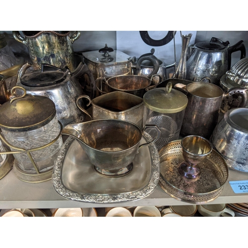 233 - Mixed silver plate and EPNS to include a teapot, mixed cutlery, a bottle holder, a square side dish ... 