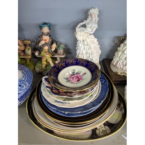 235 - Mixed china and ceramics to include two Oriental style vases, decorative plates, Capodimonte style f... 