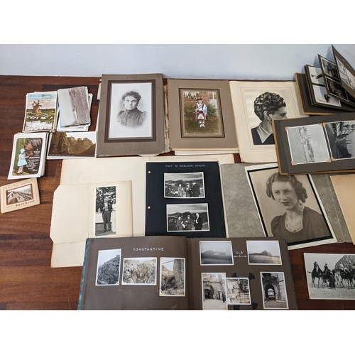 248 - A collection of early 20th century photograph albums along with vintage postcards
Location: 3-1
If t... 