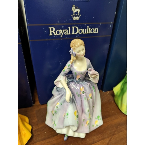 250 - A group of four boxed Royal Doulton figurines to include: No 2937 