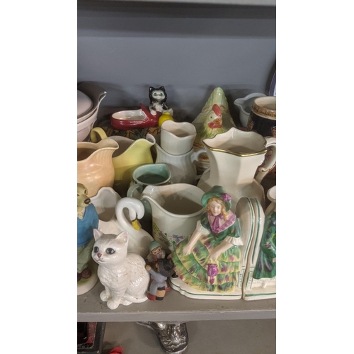 264 - Mixed ceramics and collectables to include Poole pottery part dinner service, a pair of Figural book... 