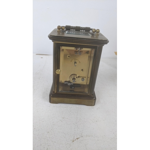 267 - A 20th century Mathew Norman brass cased mantel clock 
Location 2.1
If there is no condition report ... 