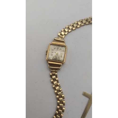 28 - A lady's 18ct yellow gold cased wrist watch on a gold plated strap A/F 13.7g, together with a yellow... 