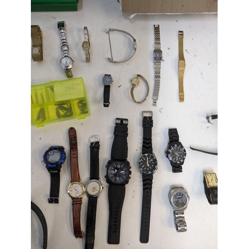 287 - A mixed lot of watch and watch spares to include various ladies and gents wristwatches, replacement ... 