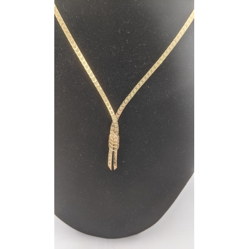 29 - A 9ct yellow gold flat link necklace with tasselled and hoped end 3.6g
Location:CAB2
If there is no ... 