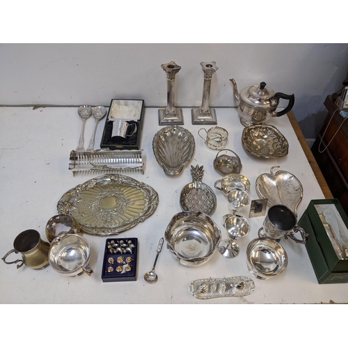 292 - Silver plate to include a pair of Corinthian Capital candlesticks, dishes, tea set and other items
L... 