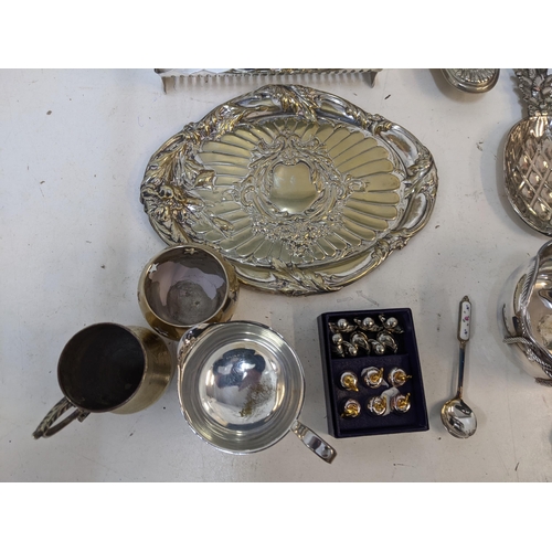 292 - Silver plate to include a pair of Corinthian Capital candlesticks, dishes, tea set and other items
L... 