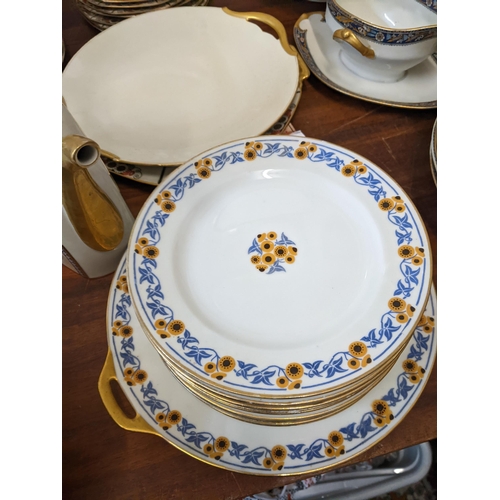 317 - A mixed collection of French porcelain to include Theodore Havilland floral salad plates, Saint Arma... 