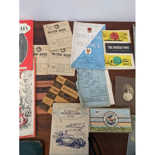 323 - A mixed lot of ephemera to include an international rugby match programme for England vs France 1955... 