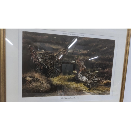 409 - Four framed and glazed pictures to include: a limited edition 195/350 print signed Timothy Greenwood... 