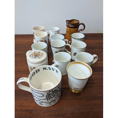 424 - A group of commemorative ceramics to include: a Royal Doulton No 4984 Queen Victoria jug, a Wedgwood... 