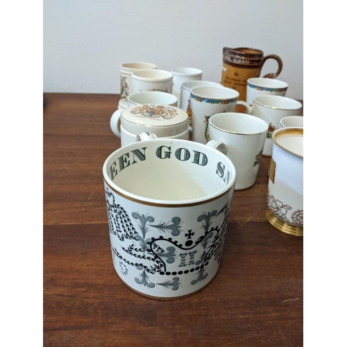 424 - A group of commemorative ceramics to include: a Royal Doulton No 4984 Queen Victoria jug, a Wedgwood... 