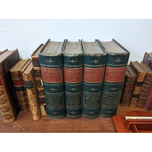 427 - A collection of vintage books to include: Waverley novels volumes 1-4, 