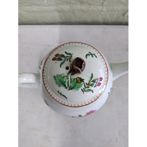 430 - A Worcester 18th century hand painted tea pot decorated with a floral design A/F
Location: 1-1
If th... 