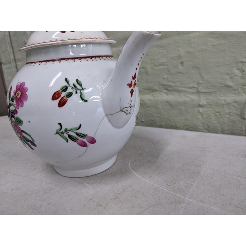 430 - A Worcester 18th century hand painted tea pot decorated with a floral design A/F
Location: 1-1
If th... 