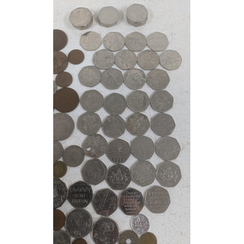 459 - World coinage to include: silver British examples, a collection of 50ps xerox 50 years coin set alon... 