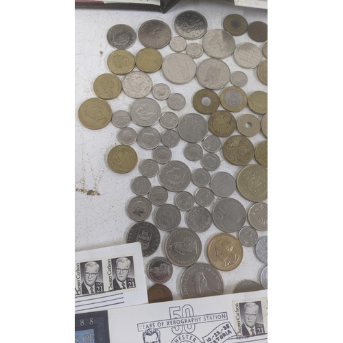 459 - World coinage to include: silver British examples, a collection of 50ps xerox 50 years coin set alon... 